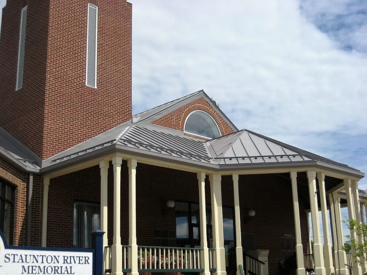Skilled roofing craftsmen working on a residential roof in Lincoln
